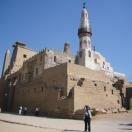 Newer mosque amidst ancient structures at Luxor Photo - Luxor Temple, Luxor, Egypt 
