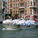 The laundry boat - everything travels by water Photo - Venice, Italy 